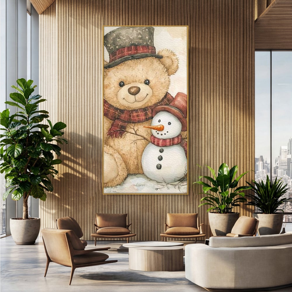 Tablou canvas cu ilustratie cu ursulet si om de zapada, in rama de aluminiu auriu, pe perete intr-un birou